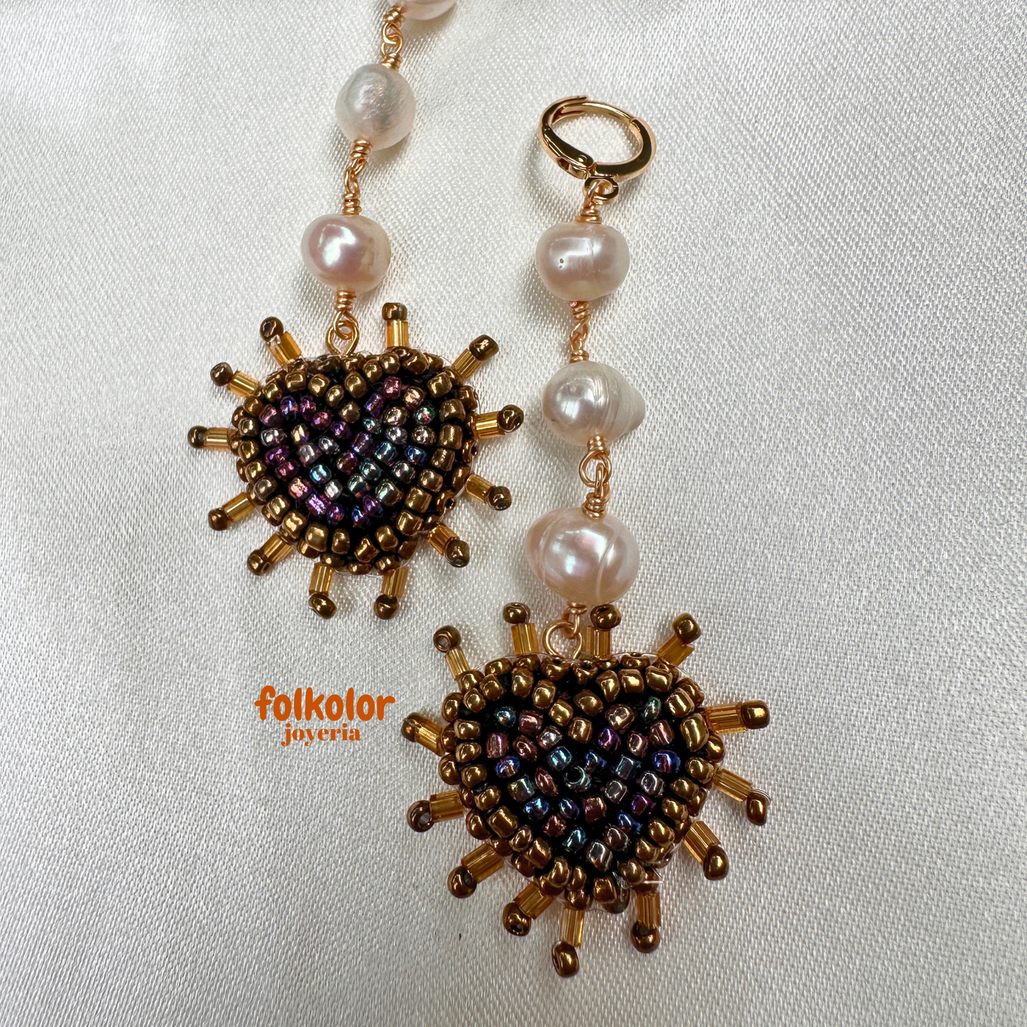 Estela aretes